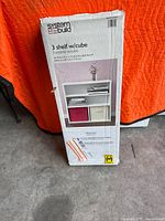 Front of boxed SystemBuild 3 Shelf w/Cube unit