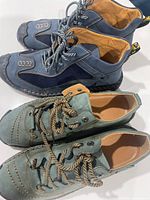 Top view of both pairs showing colors, style, unworn uppers