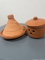 Tagine and storage pot side by side
