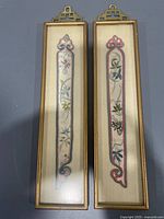 Front view of both framed embroidery panels