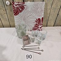 All items grouped: glass tray, fern jar, liquor and shot glasses, stir sticks, Umbra cube