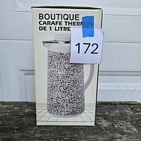 Front of retail box showing product image and capacity