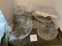 All six glass serveware pieces grouped
