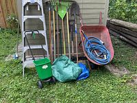 Full view of all items leaned against shed