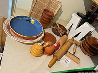 Overall lot showing ceramic, terracotta, wood and bamboo items