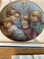 Leah's Family plate close-up in foam packaging