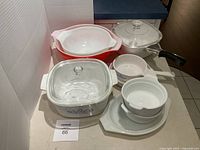 Group shot of all cookware pieces with lids displayed