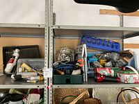 Overview of shelves with assorted tools and supplies
