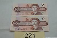 Both 1986 Canadian $2 notes front view showing Queen Elizabeth II and denomination