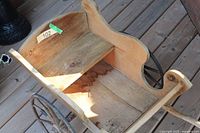 Top view inside cart body highlighting wood condition