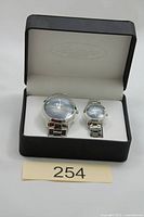 Open Antonino Collection box showing both wristwatches