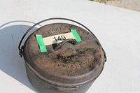 Top view of Dutch oven showing full piece and embossed markings