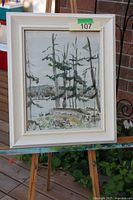 Full view of framed Mendelow painting on easel