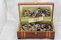 Overall view of jewellery box open showing contents
