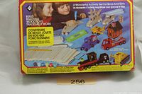 Front of boxed Junior Woodworkers Toy Factory set showing illustrations and contents list