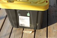 Overall view of black tote with yellow lid