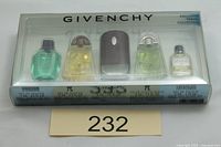 Front view of boxed Givenchy Exclusive Travel Collection showing five miniature perfume bottles