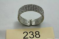 Front view showing multi-row rhinestone band