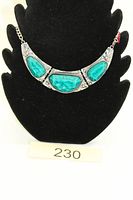 Front view of necklace on display form