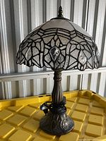 Full view of lamp showing shade, column, and base