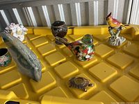 Group shot showing all decorative items on yellow surface