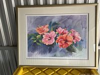 Front view of framed floral print showing artwork, mat and frame