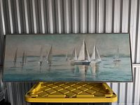 Full frontal view of entire stretched canvas depicting sailboats