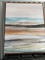 Full view of framed canvas painting