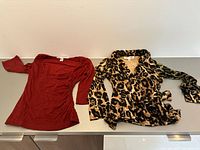 Both tops laid flat side by side