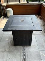 Full view of fire table with lid closed