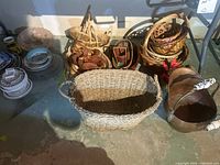 Group shot showing all baskets and copper pot