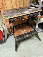 Full view of Black & Decker Workmate 550 bench with tabletop and lower shelf