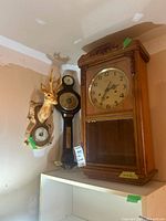 Wood wall clock, deer head barometer, banjo barometer
