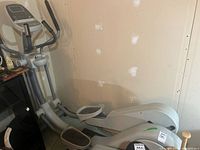 Full side view of Diamondback 850E stepper showing frame and pedals