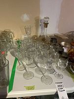 Overall view of decanter, matching glasses and assorted stemware