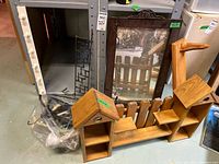 Lot overview showing shelves, mirror, hangers, bag of hooks