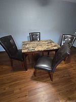 Dining set overall view showing table and four chairs