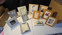 All eleven assorted photo frames displayed