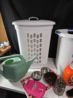 Laundry hampers, watering can, pet accessories, French press, bowls