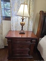 Side table with lamp showing overall design and finish