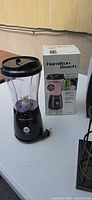 Hamilton Beach personal blender beside its box