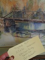 Close-up of bridge section and handwritten tag noting signed A/P 23x16