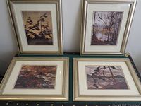 All four framed prints displayed together
