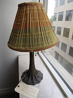 Full view of lamp showing base and shade