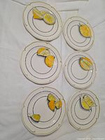 Six lemon motif plates front view