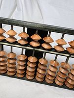 Close view of beads and frame detail