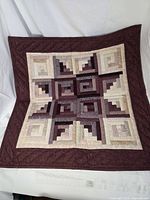 Full view of wall hanging showing pattern and border