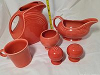 All six persimmon Fiesta pieces grouped