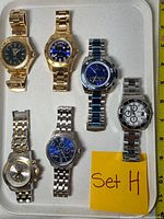 Front view of all six Invicta watches displaying dials and finishes