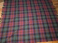 Full view of the plaid wool blanket laid flat showing colour pattern and size proportion